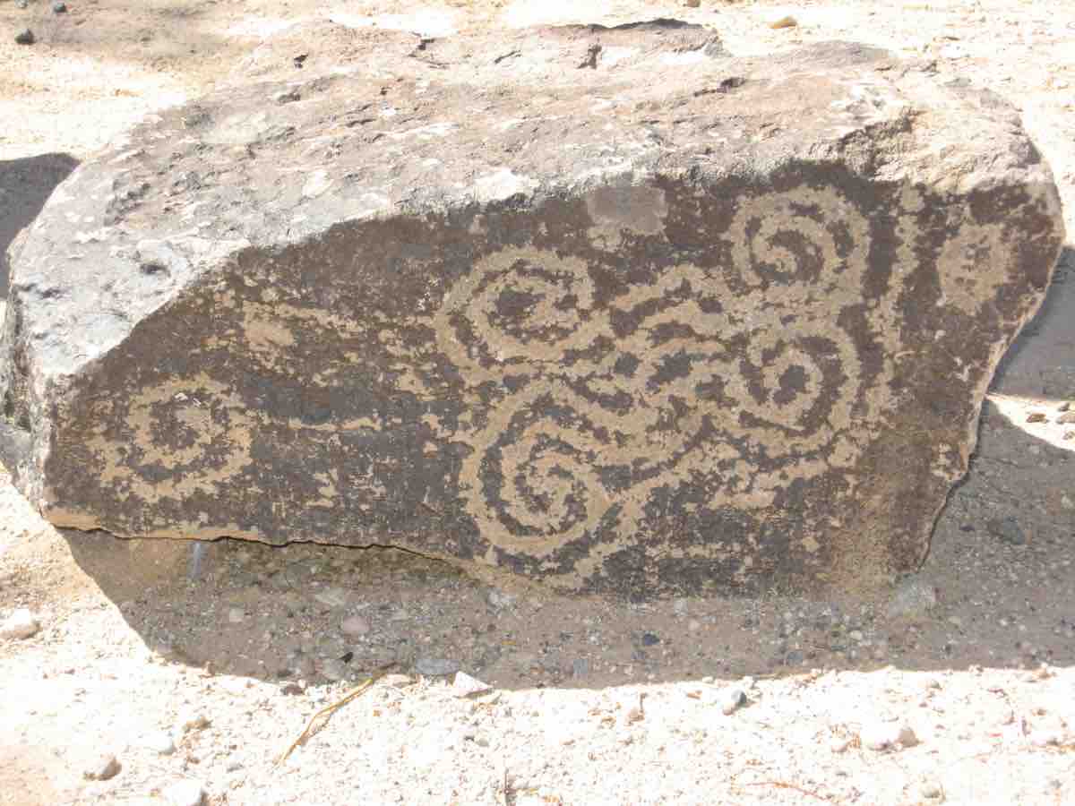 fossilized drawing etched into a rock